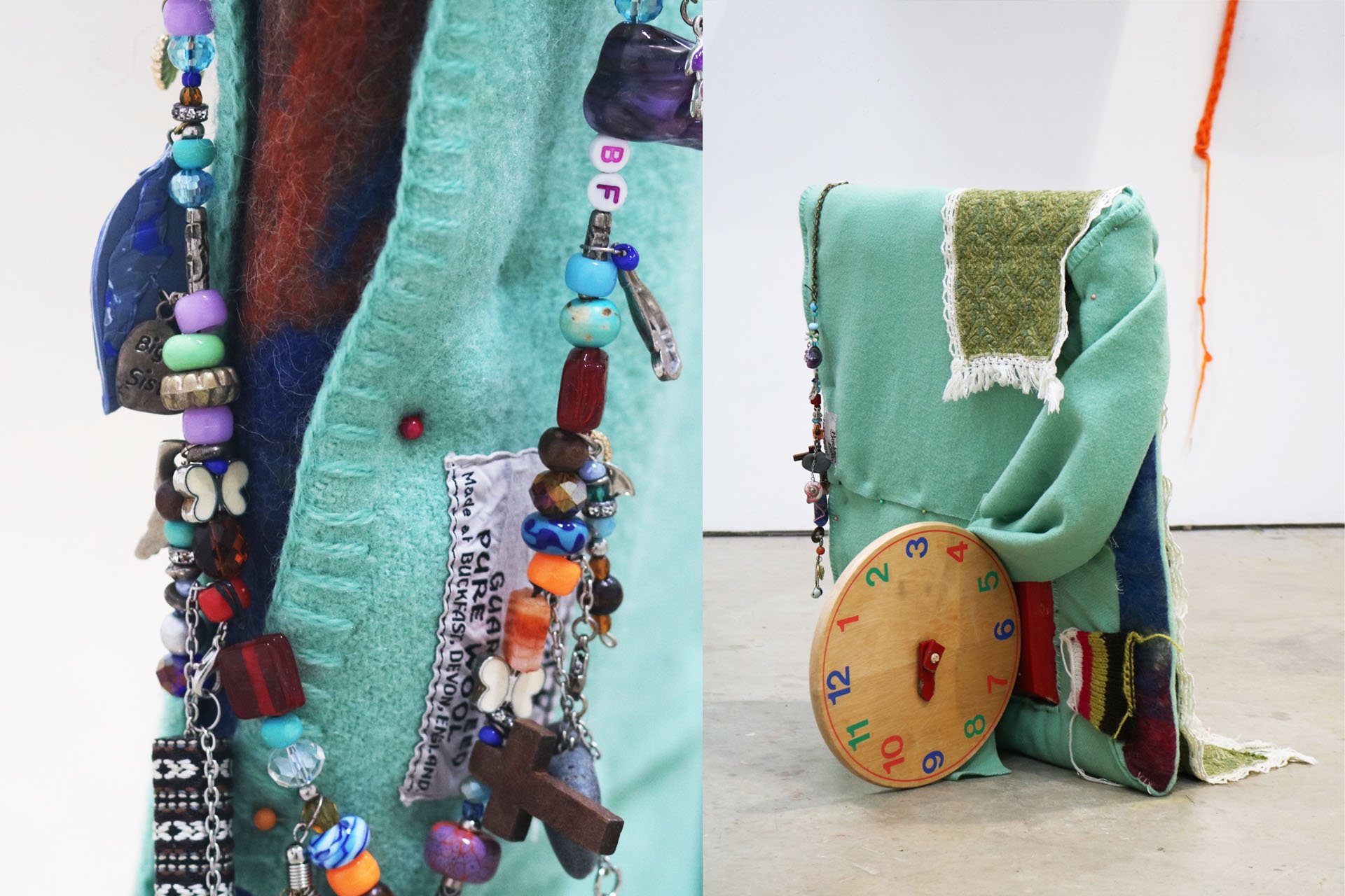Sculpture of wool and felt, moss, assorted beads, sewing pins, table runner, wooden teaching clock. 